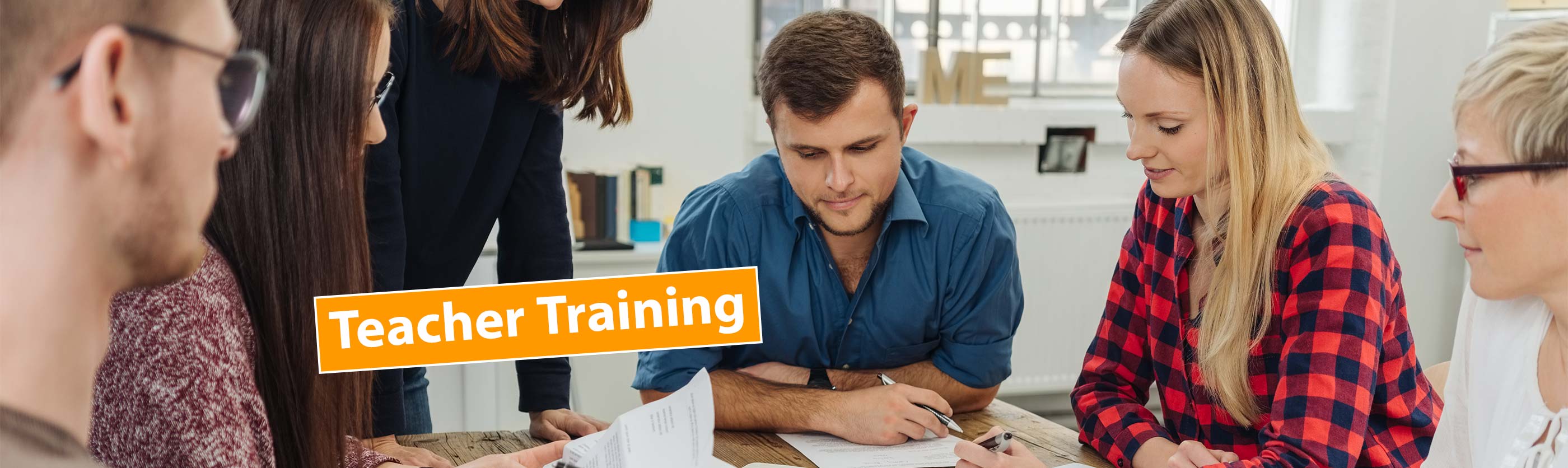 Image of teachers discussing traing